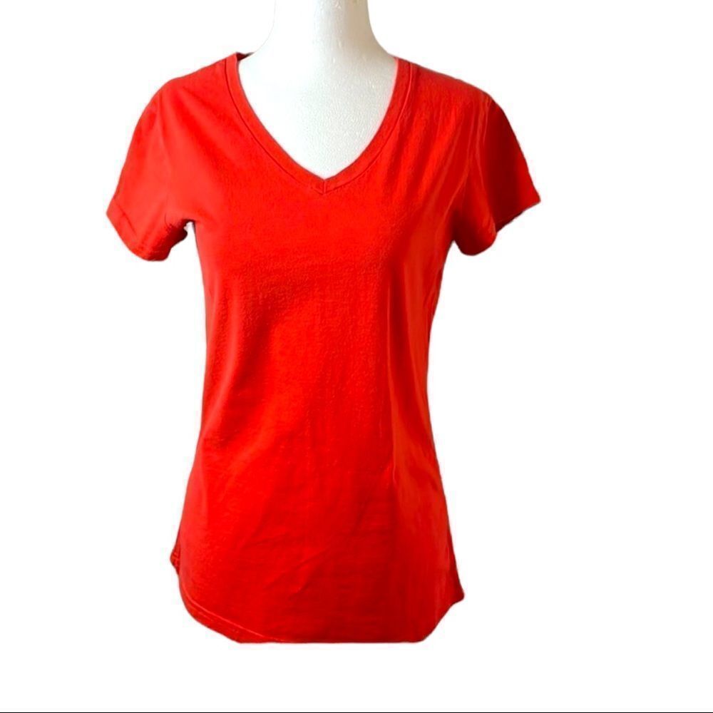 LADY Foot Locker red short sleeve V-neck T-shirt size small. 100% combed cotton.